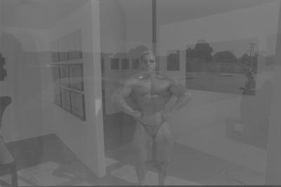 front lat spread black and white through window